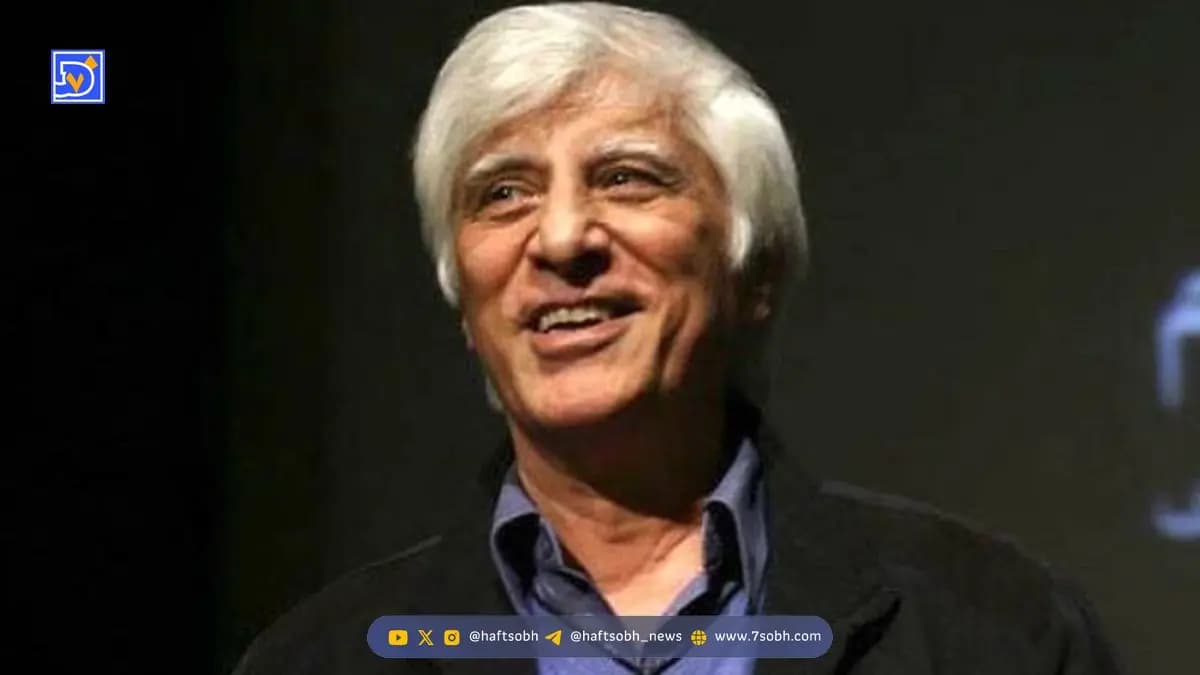 میز عزای لاکچری بهرام بیضایی در آمریکا؛ رومیزی ایرانی با ترکیب عکسهای دوران کودکی، شمع و گلهای سفید + عکس